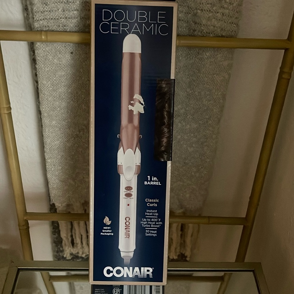 Conair curling iron , Color is white and rose gold.